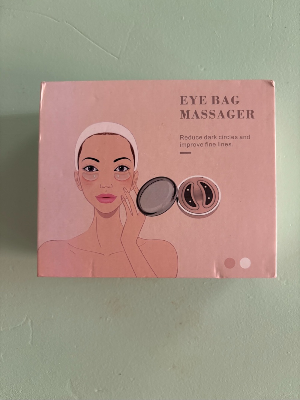 Eye bag massager with red LED